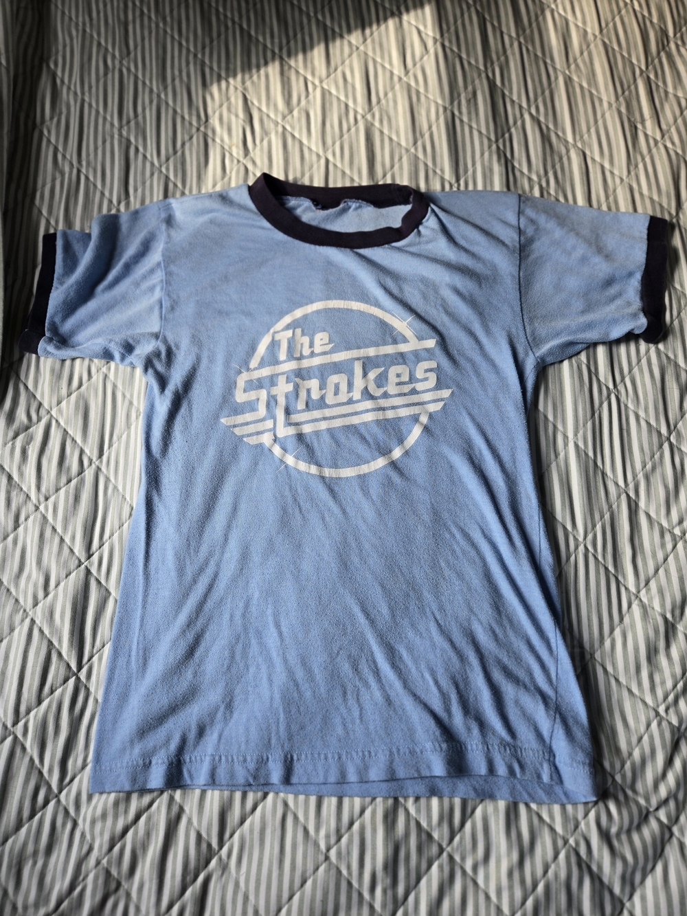 The Strokes Graphic Ringer Tee in Light Blue with Navy Trim